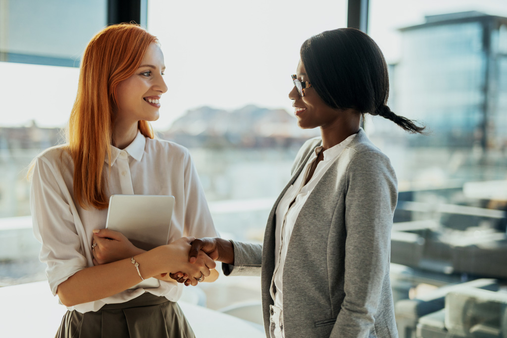 Small business consultant women talking about business strategy professional small business consulting